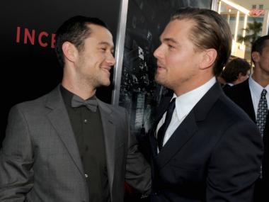 Joseph Gordon-Levitt, seen here with Leonardo DiCaprio at the premiere of  the movie 'Inception', wasn't on the set of his new movie when a man head-butted a P.A.