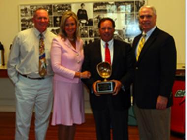 John Mazzuto (second from right) donated stocks to Yale University and had a baseball field named in his honor.