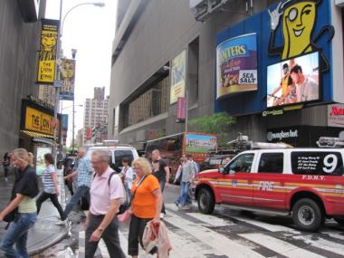 It was business as usual Monday morning at the corner of 45th Street and Seventh Avenue, two days after police discovered an SUV loaded with explosives there.