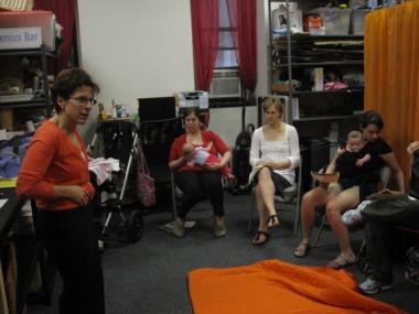 Instructor Lisa Hoffman talks about strengthening abdominal muscles at her Mommy Mush class.