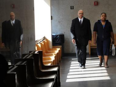 NYPD housing officer David London heading to his trial.