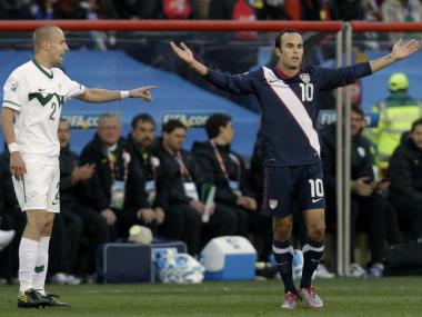 United States' Landon Donovan, right, gestures as Slovenia's Miso Brecko, left, points to him during the World Cup group C soccer match between Slovenia and the United States at Ellis Park Stadium in Johannesburg, South Africa, Friday, June 18, 2010.