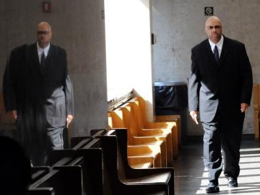 David London arrives at court for the opening of his assault trial.