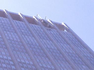 Two window washers managed to avoid getting hurt after the platform they were working on malfunctioned 42 floors above the street.