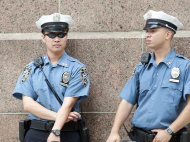 Traffic Agent Jiang (L) issued the ticket to the shocked nuns.