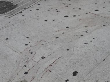 Blood remained on the sidewalk from the scene of the accident Friday morning.