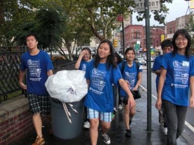 Participants in last year's Chinatown Beautification Project fanned out over local streets to collect trash.
