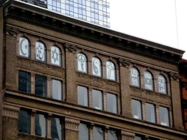 Russell Simmons' apartment windows make a statement about the Ground Zero mosque with help from photographer Glen E. Friedman.