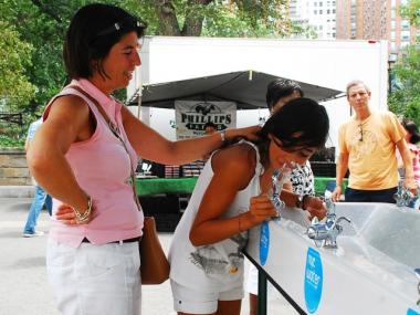 Fabrine and Constance (drinking) gave the water a thumbs up.