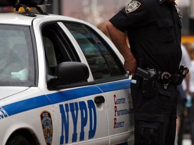 FILE PHOTO - An NYPD detective, not pictured, was denied entry into a Harlem community meeting because he would not relinquish his gun beforehand.