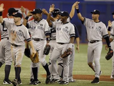 The Yankees celebrate a post-season berth after beating the Toronto Blue Jays 6-1 during at the Rogers Centre on Sept. 28, 2010.