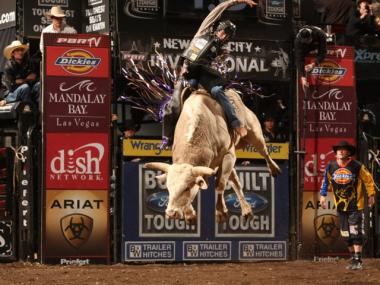 JB Mauney rides Walton & Wagoner-Berger & Struve's Code Blue for 76.25 points during the Championship round of the New York Built Ford Tough series PBR.