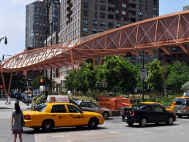 The LMDC gave $20 million Monday to help build a pedestrian bridge over West Street at West Thames Street.