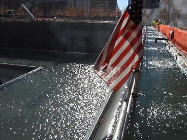 One of the 9/11 memorial waterfalls was tested last year. The memorial is scheduled to open this fall and is expected to draw millions of tourists a year.