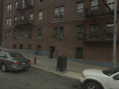 Neighboring buildings on Isham Street experienced at least two robberies last week.
