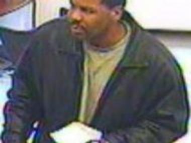 Suspect wanted in connection with two Capital One robberies