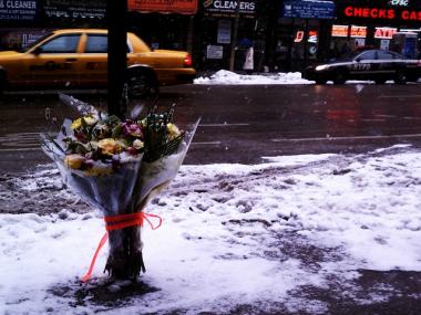 Flowers were left to memorialize Laurence Renard on a First Avenue sidewalk Tuesday.