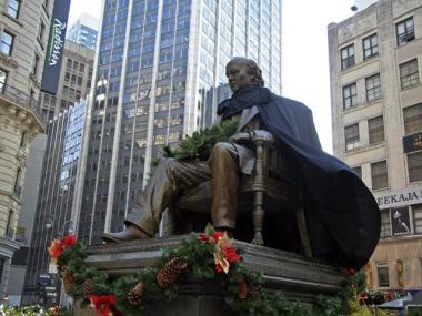 Greeley Square's statue of Horace Greeley dons a cape as part of NBC’s promo for its new series, “The Cape.”