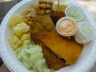 Veal and Chicken Schnitzel, Burger Lolli with Cheese, Austrian Potato Salad, Cucumber Salad, Braised Sauerkraut and Chickpea Salad at the Vendy Awards.