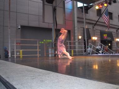 A dancer performs in Times Square as part of Project Dance's Saturday show.