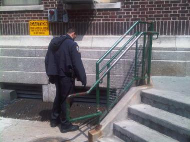 Police search for evidence after the shooting.