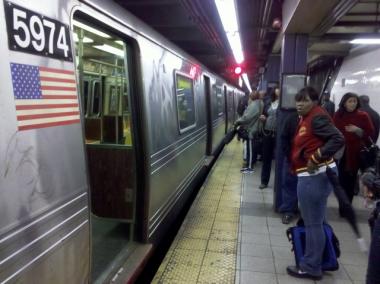 Passengers had to leave a train at the Chambers Street station after police chased a man at the Canal Street station.