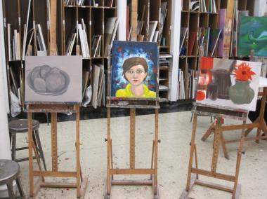 Works on display in the art school's painting studio.