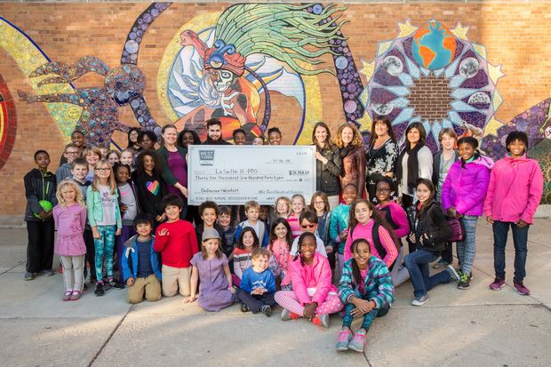  Money from this past summer's street festivals was given to local schools in Wicker Park and Bucktown by the West Town Chamber of Commerce. 

