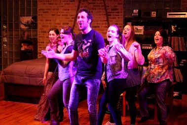  Pictured L-R: Amy Stricker  (marie/charlie), Britain Gebhardt (sarah/liz us), Max DeTogne (rob), Lizzie Schwarzrock (anna/allison), Kelly Baskin (penny/backup singer/laura us), Caitlin Jackson (liz).  