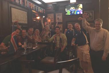 Members of the Icelandic Association of Chicago celebrate Iceland's enormous upset of England at Fado Irish Pub in the Euro soccer tournament Monday.