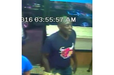  Police released an image of the man they suspect of shooting two people, one fatally, on Sept. 18. 